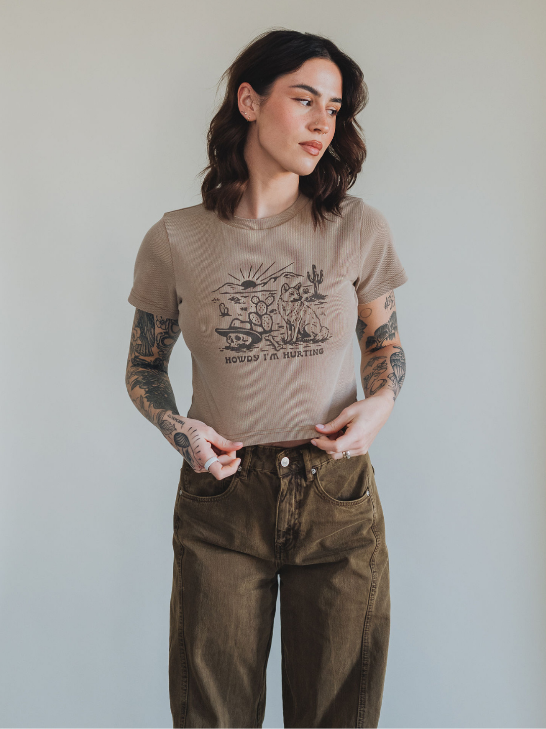 Howdy I'm Hurting Baby Tee