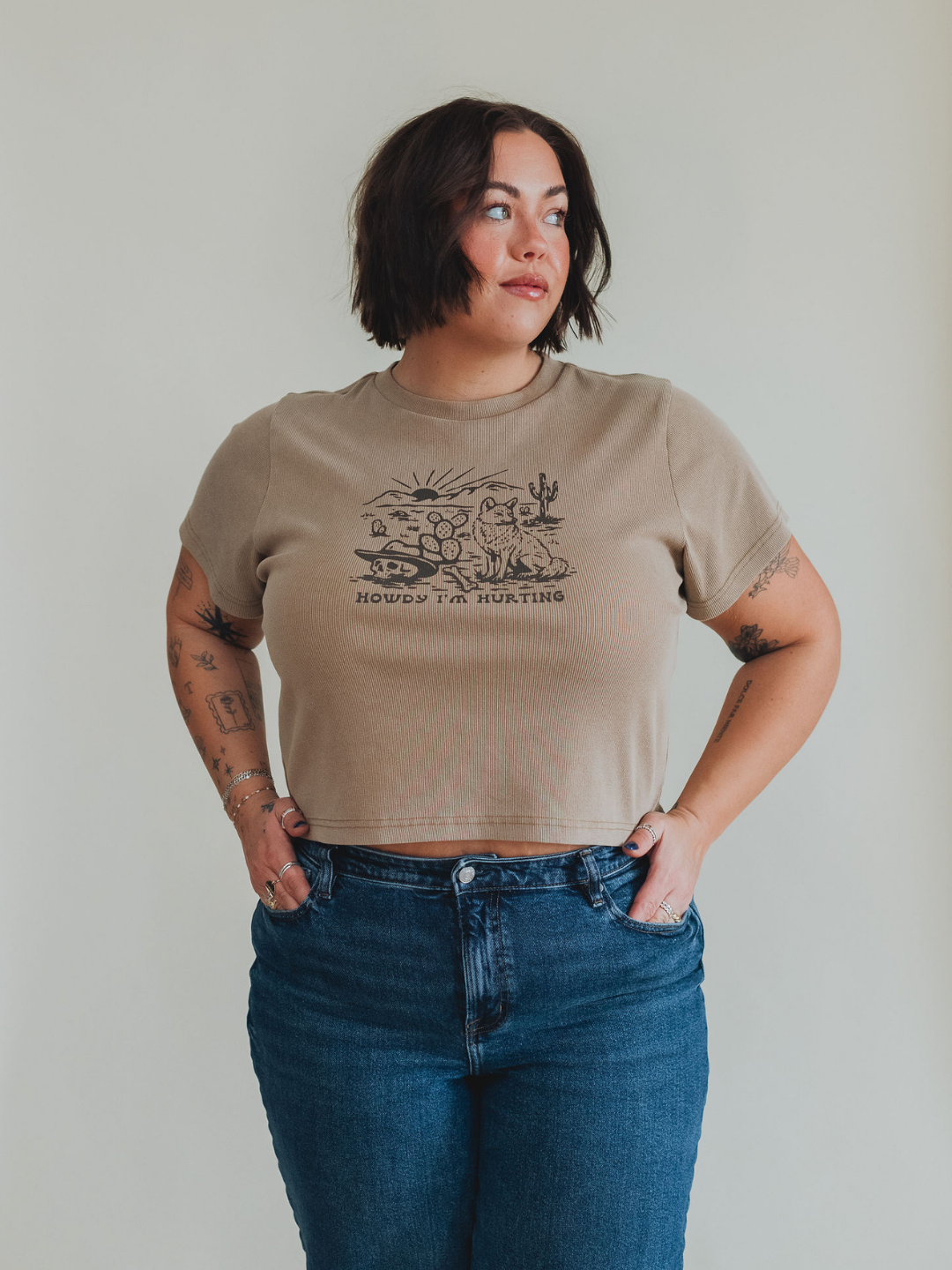 Howdy I'm Hurting Baby Tee