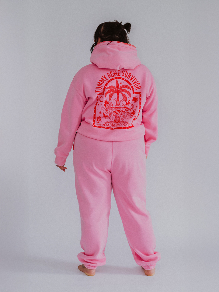 Sweat à capuche zippé « Survivant des maux de ventre »